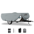 Gray pop-up camper trailer covered with waterproof, UV resistant 7-layer camper cover with secure straps and breathable fabric