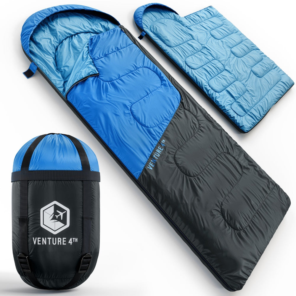 Blue lightweight sleeping bag with compression sack and carry strap