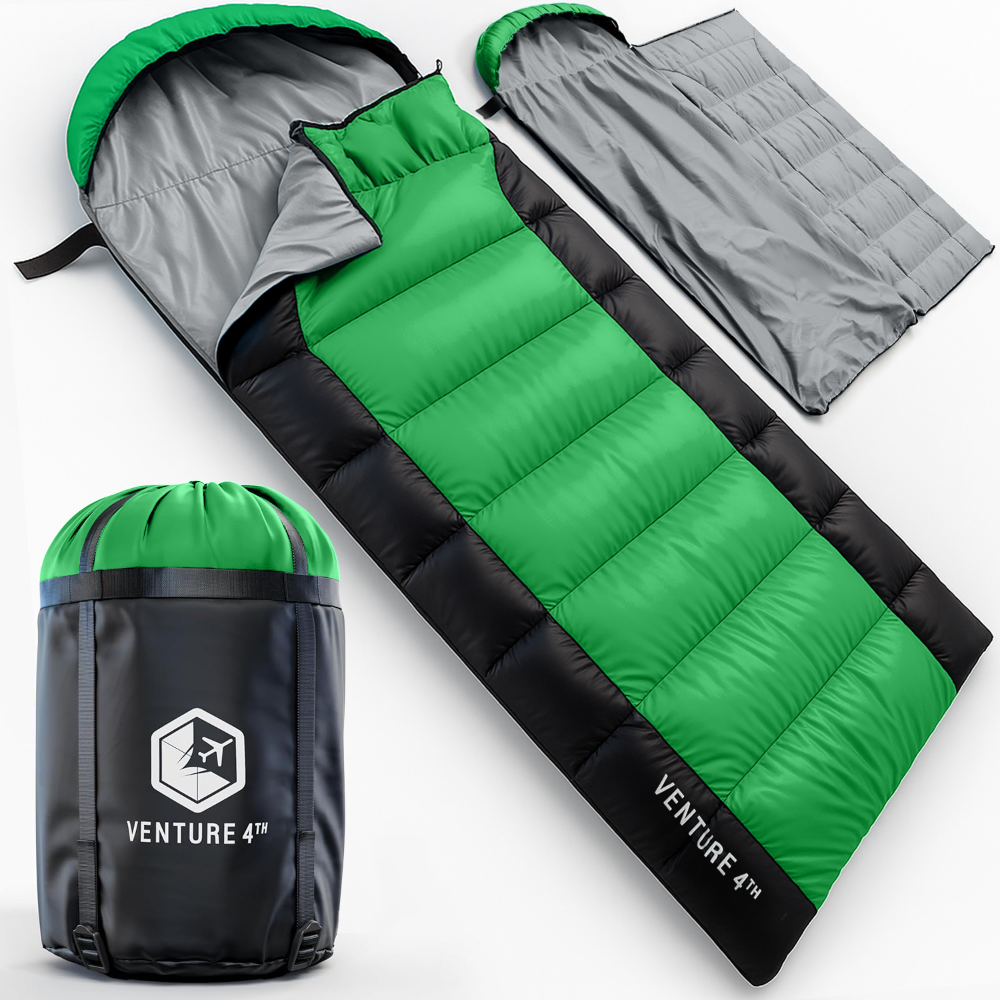Green and black sleeping bag with compression sack on a white background